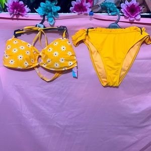 Two piece bathingsuit.  ruffles on waistline. It can be adjust 3 size on back